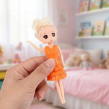 Mini Muñeca con Vestido y Accesorios, Color Naranja